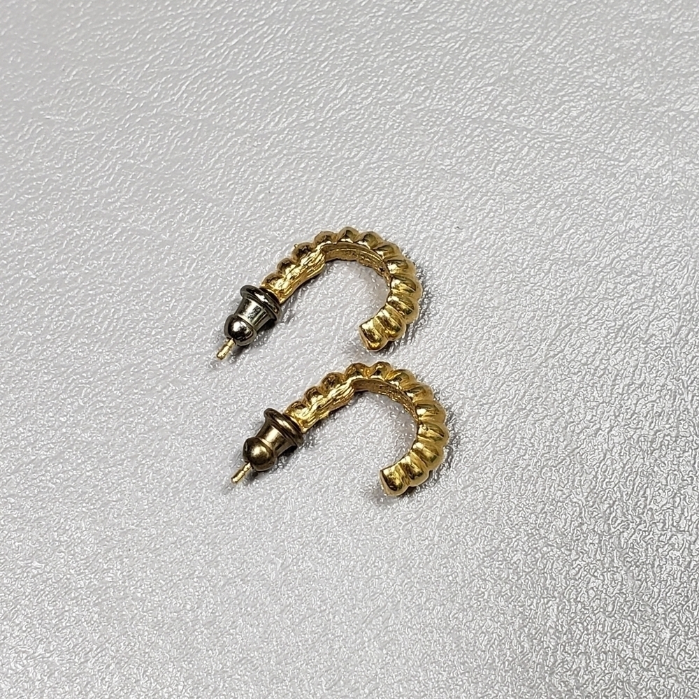 Gold colored half hoop earrings